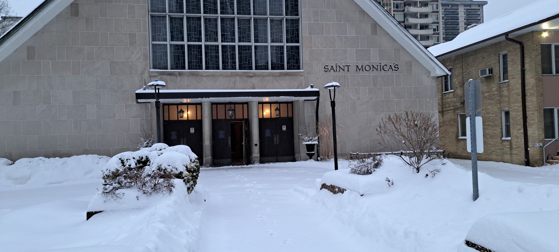 Picture of snow-covered pathway to church front door