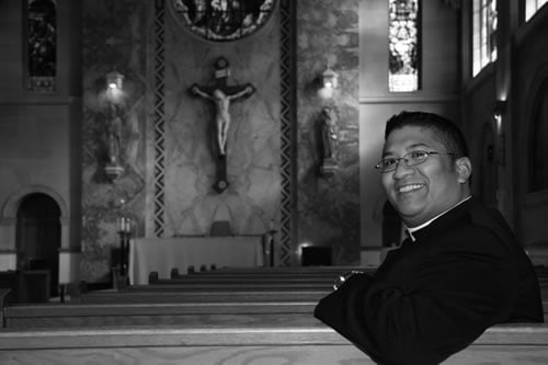 Black-and-white picture of Father Damian Young-Sam-You smiling