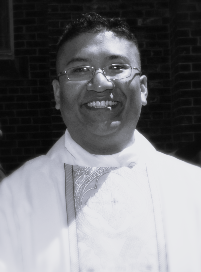 Picture of Father Damian in black-and-white
