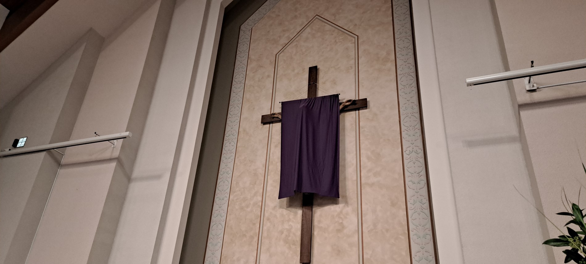 Big crucifix veiled in purple cloth