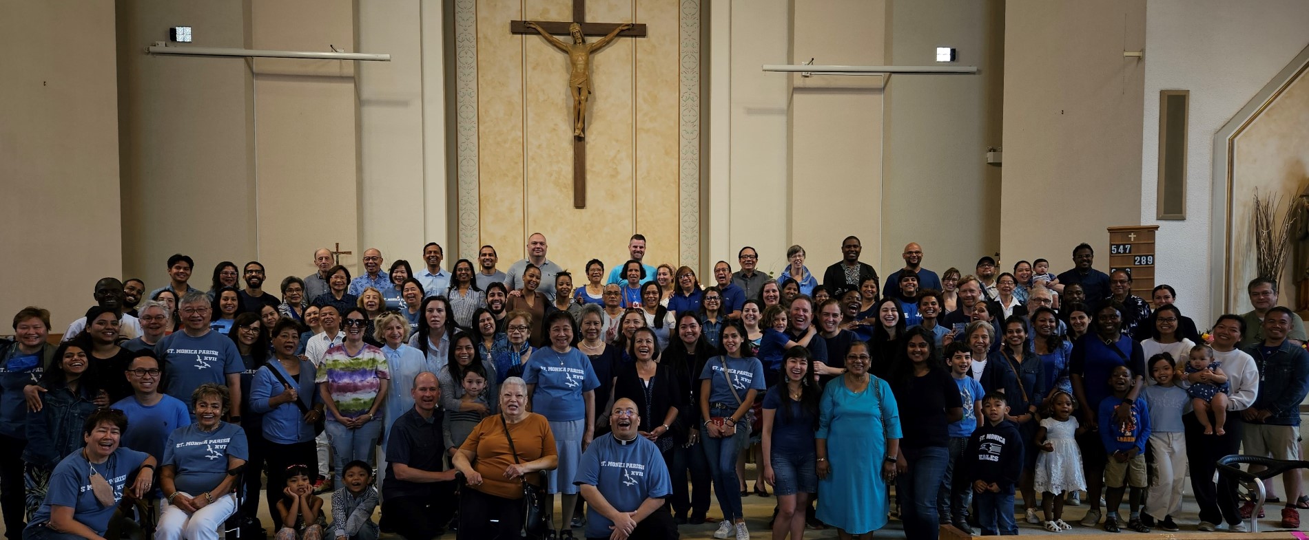 Picture of parishioners in front of altar after the 11 am Mass on Aug. 27, 2023