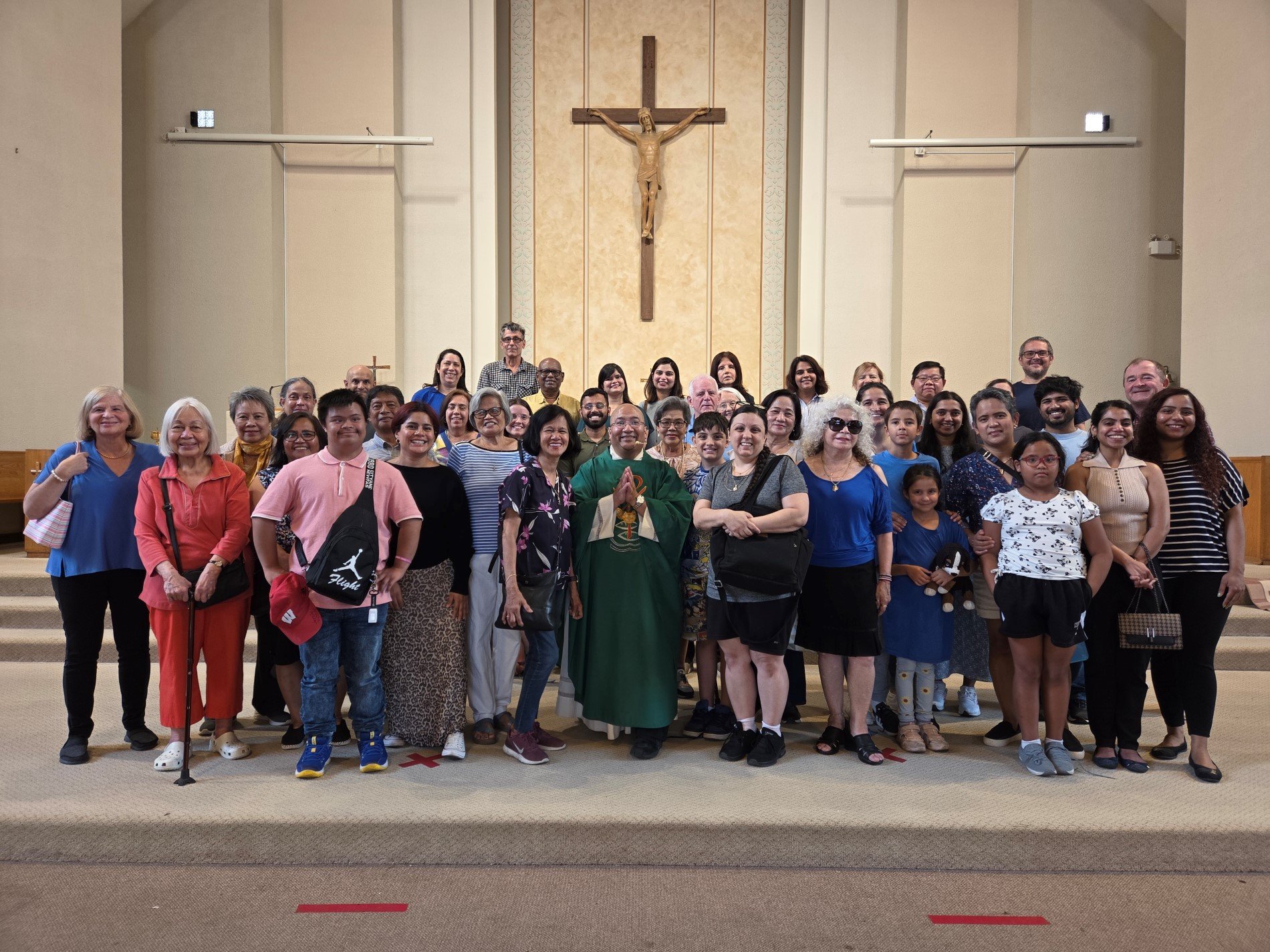 Picture of parishioners in front of the altar taken after the 5 pm Mass on Aug. 23, 2025