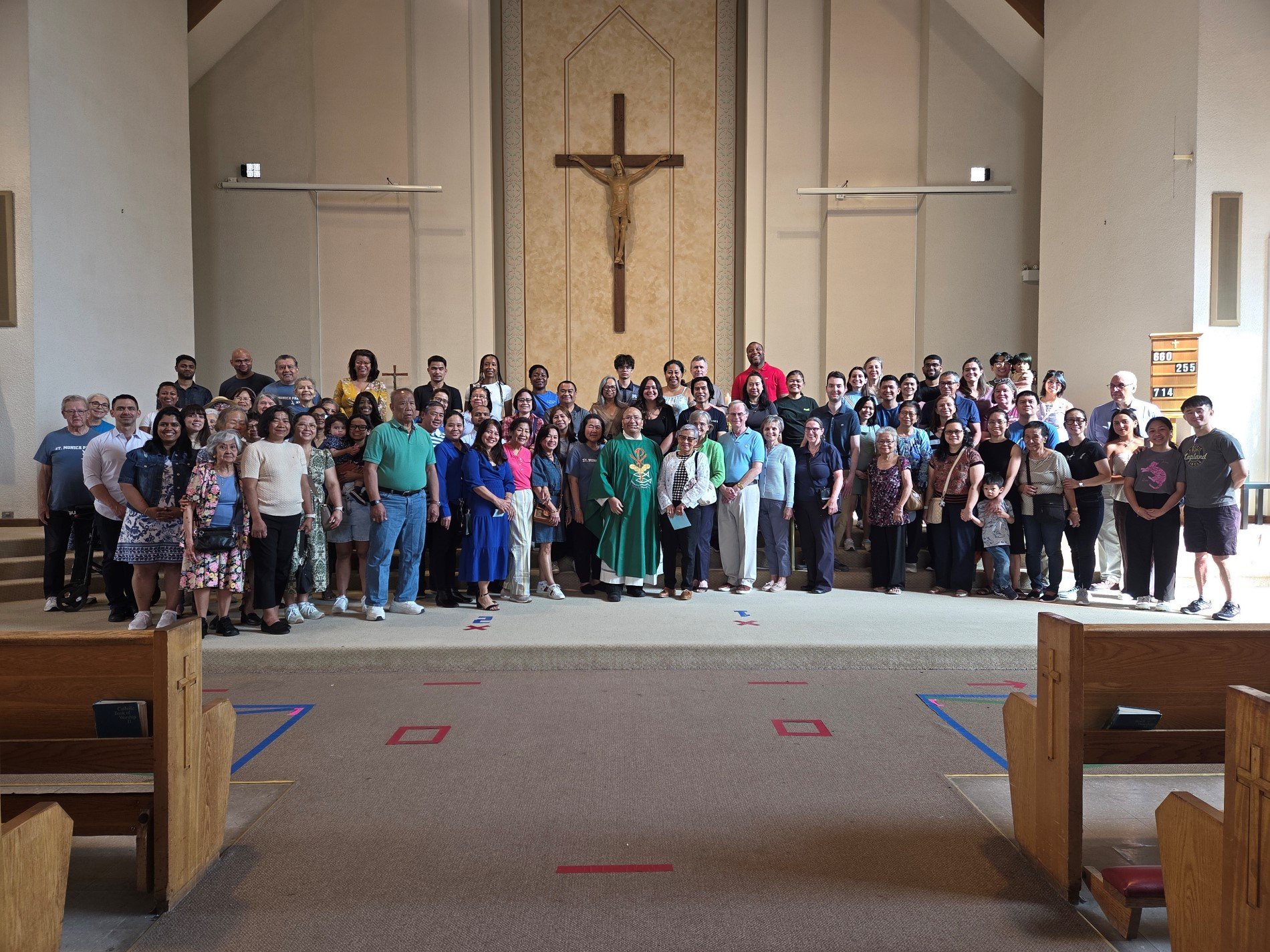 Picture of parishioners in front of the altar taken after the 9 am Mass on Aug. 24, 2025