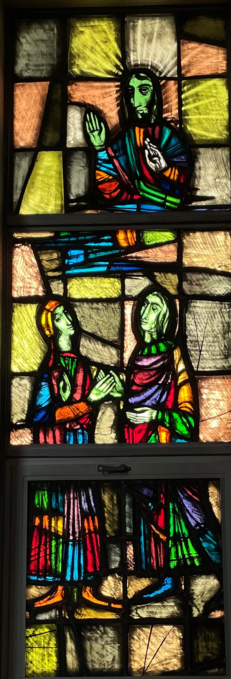 Picture of stained glass window showing a wedding