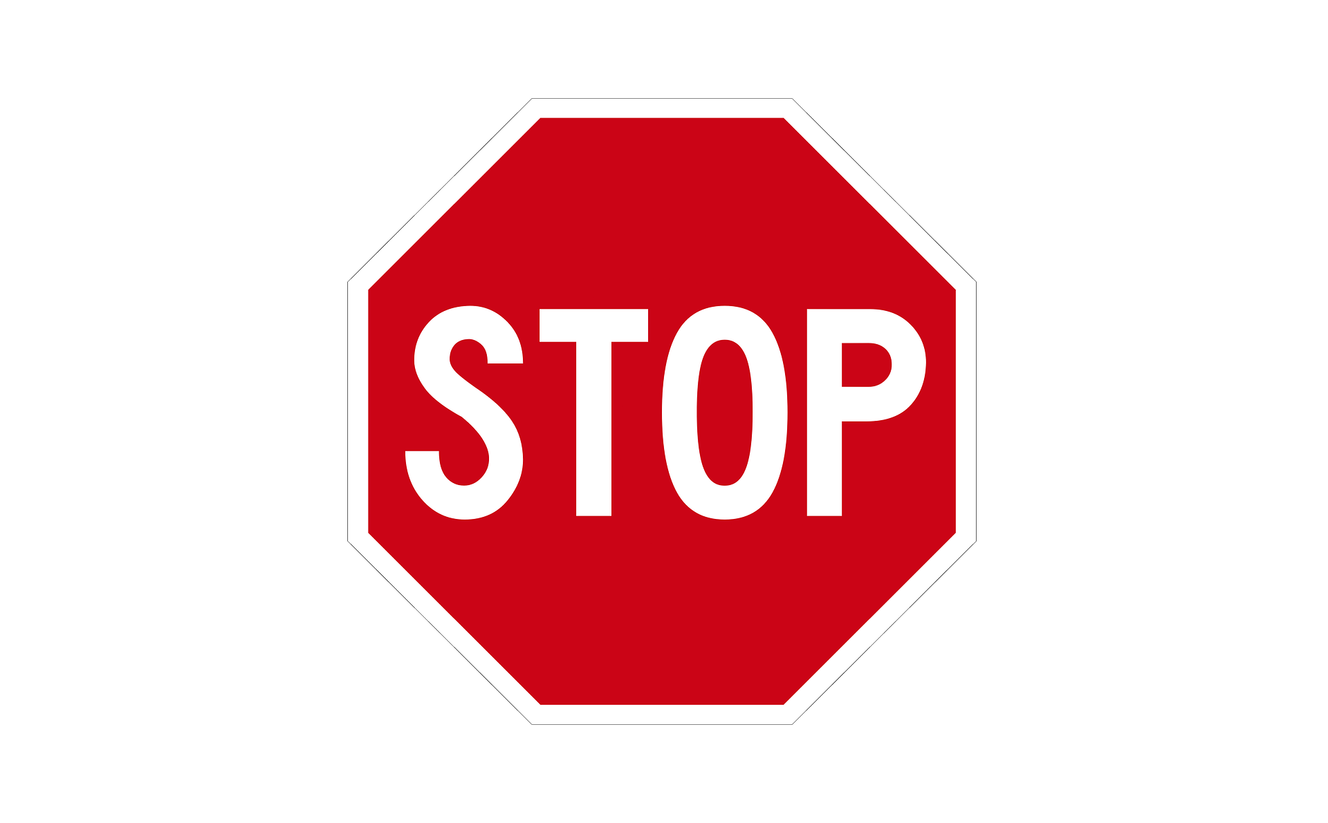 Stop sign with white letters on red background